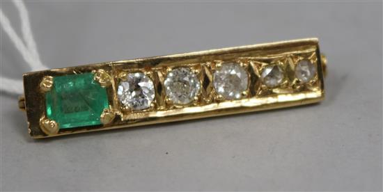 A mid 20th century French 18ct gold, emerald and diamond rectangular brooch, 3.5cm.